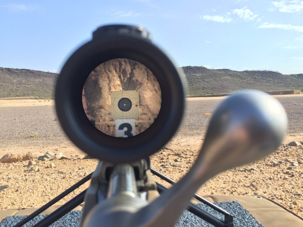 Bullseye target viewed through rifle scope
